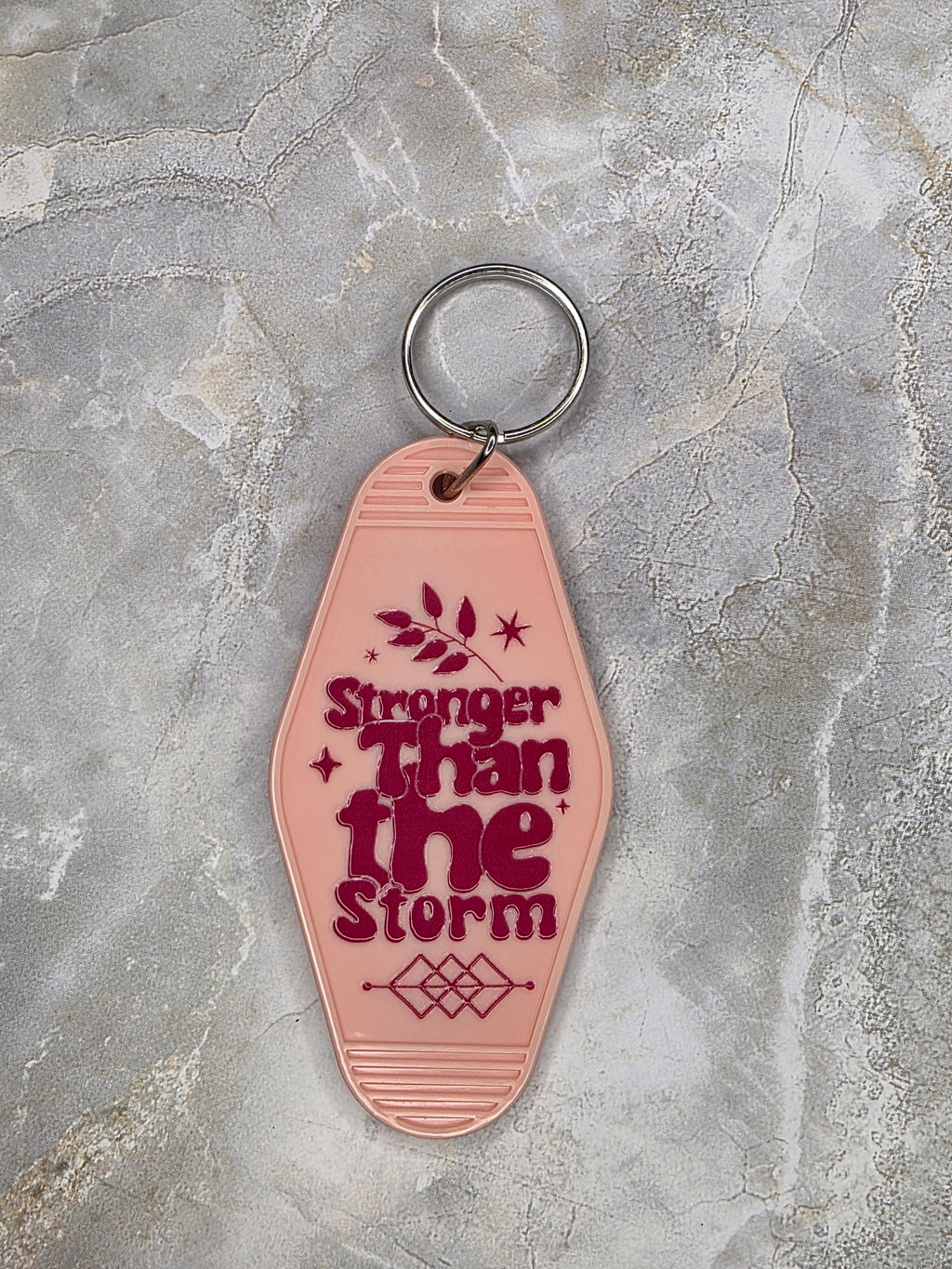 Stronger Than the Storm Vintage Motel Keychain
